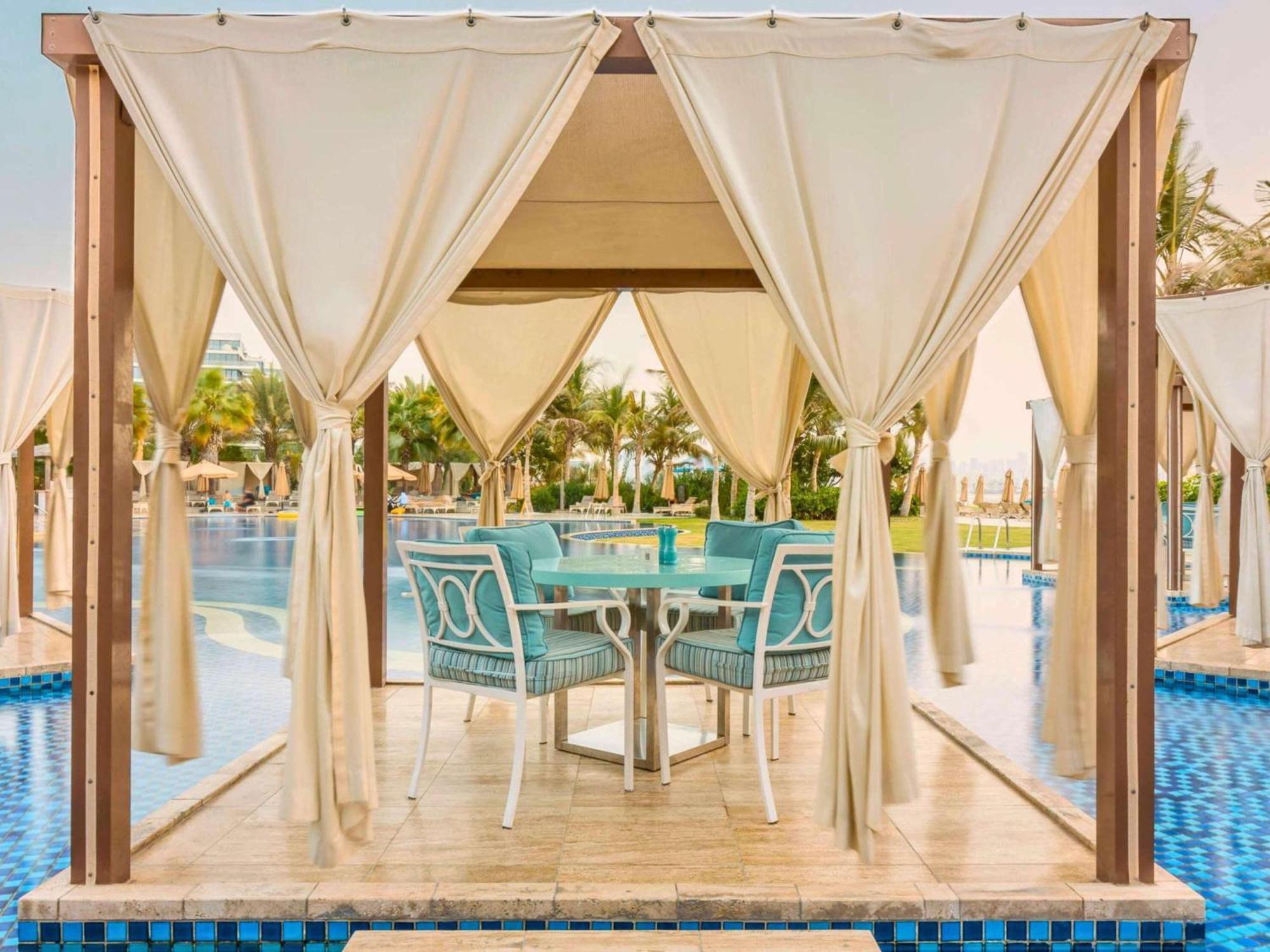 Waldorf Astoria Dubai Palm Jumeirah Exterior photo Cabana at the pool