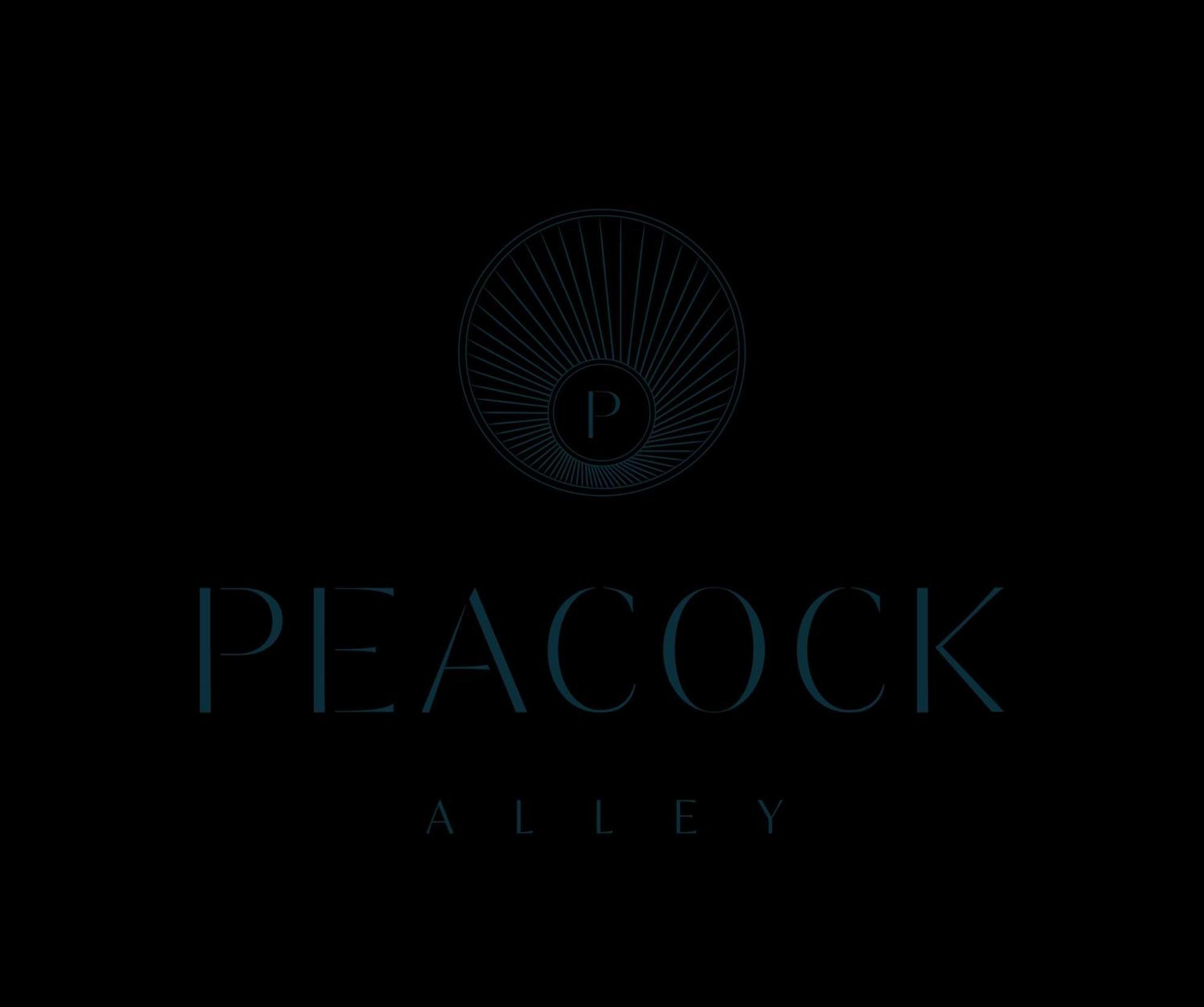 Waldorf Astoria Dubai Palm Jumeirah Exterior photo Peacock Alley logo